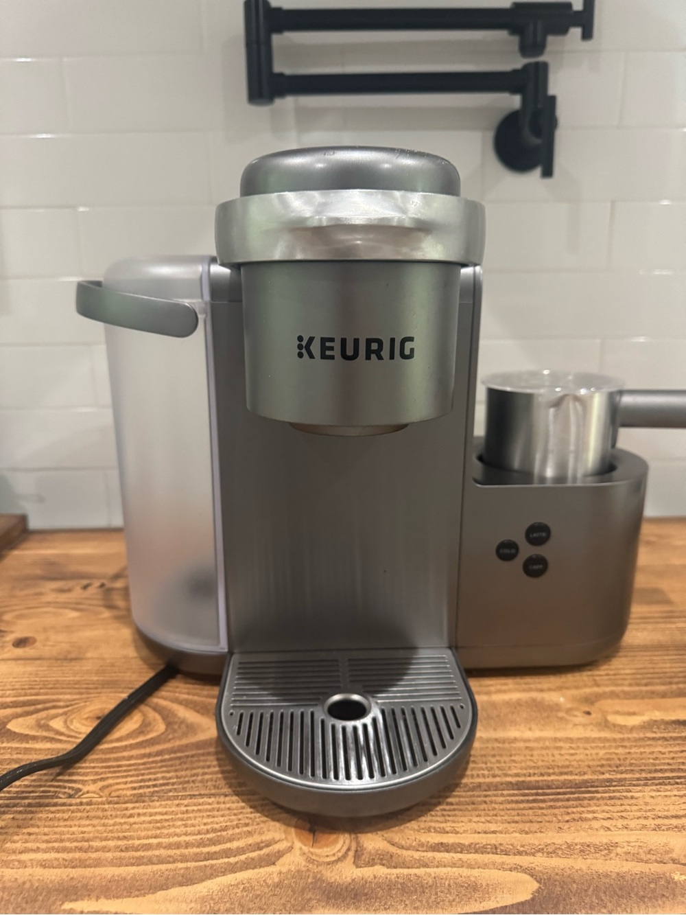Keurig Single-Serve Coffee, Latte and Cappuccino Maker in Silver Gray.